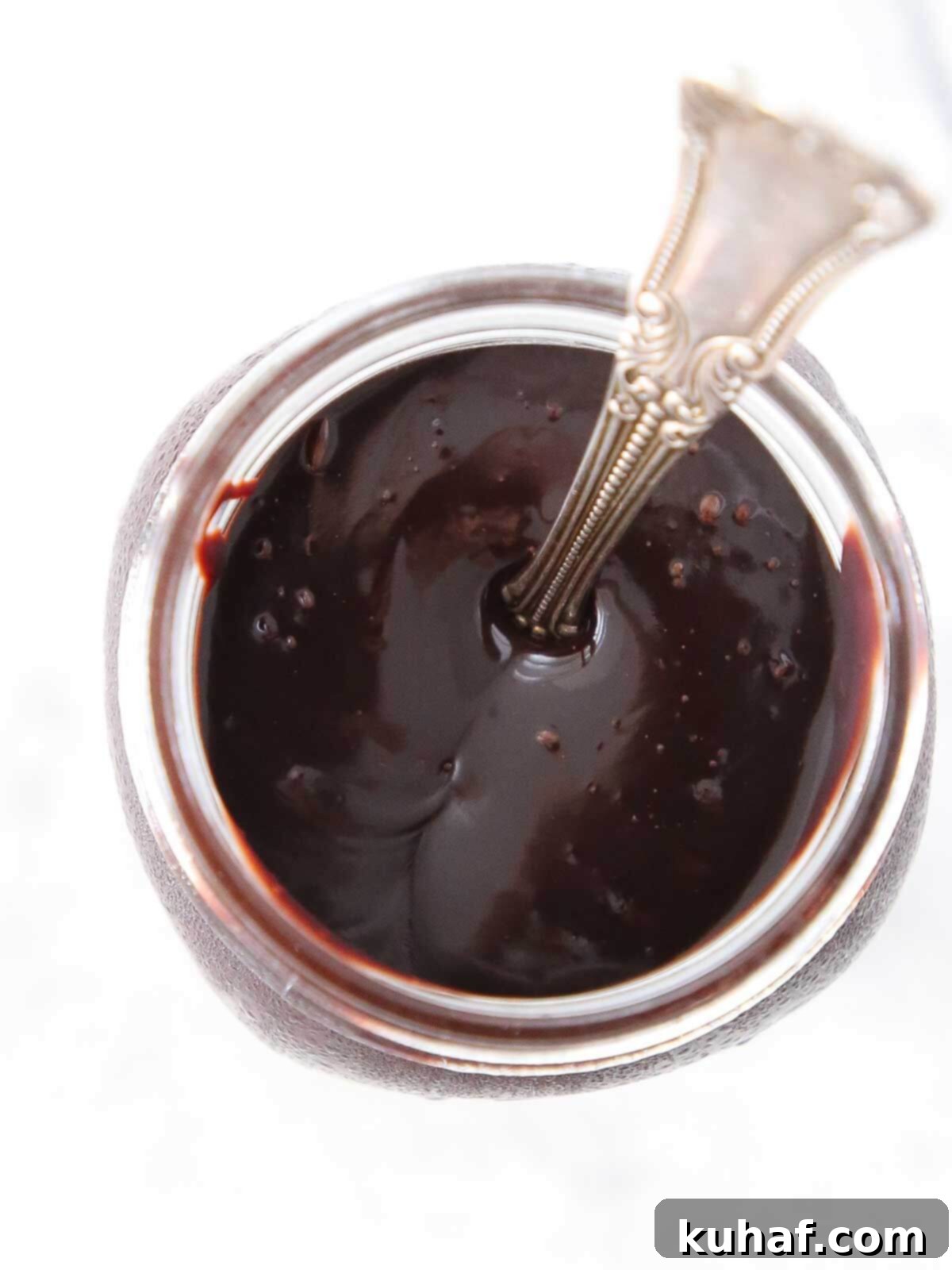 chocolate fudge sauce in jar.