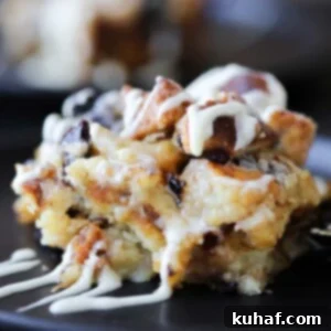 A detailed shot of a slice of bread pudding, highlighting its rich texture and deliciousness.