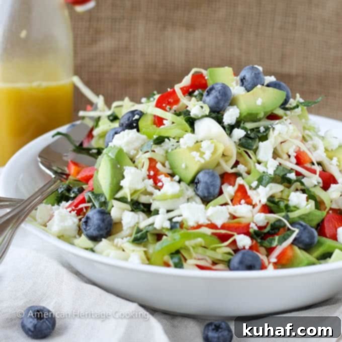 Close-up of a vibrant Healthy Kale and Cabbage Slaw Salad serving, showcasing its fresh ingredients and inviting textures.