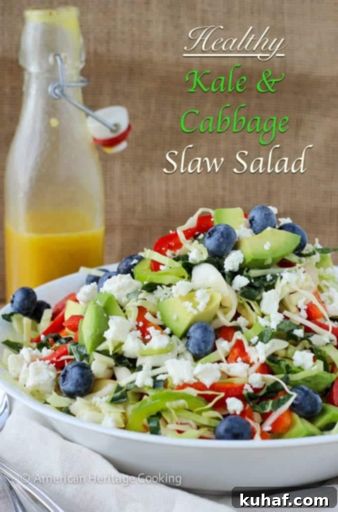 A large serving bowl filled with the colorful Healthy Kale and Cabbage Slaw Salad.