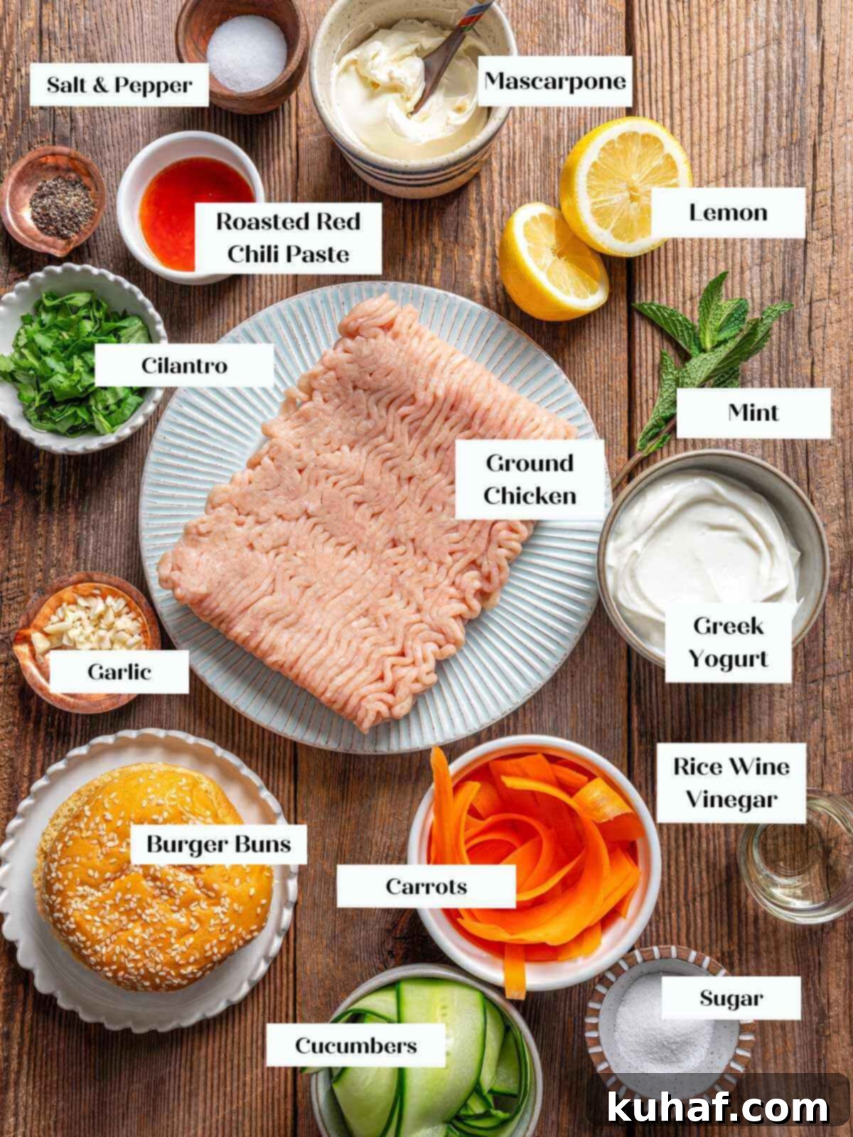 Juicy Chicken Burgers 4 chicken burger ingredients on wooden surface.