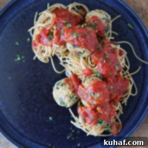 Quinoa Vegetarian Meatballs in sauce on pasta
