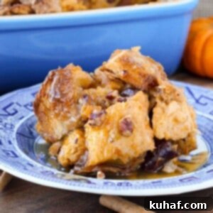 Pumpkin bread pudding with cherries and pecans close up.