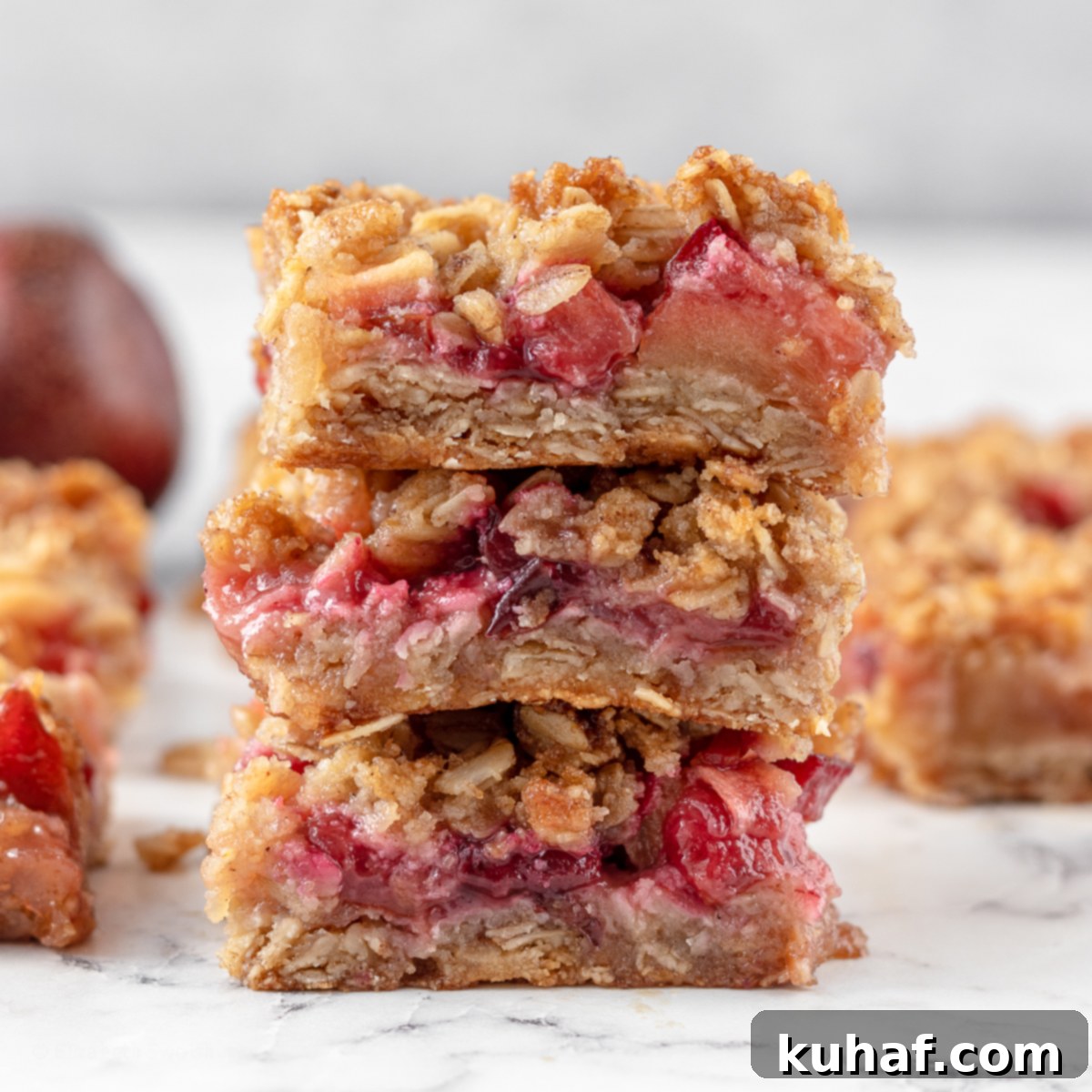 Apple and Plum Crumble Bars with a crumbly topping.