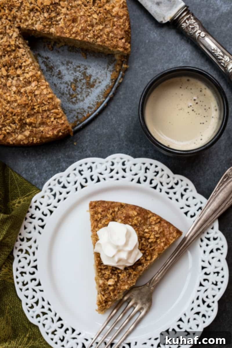 Beautifully textured apple almond cake with a crumble topping, ideal for brunch or a light dessert.