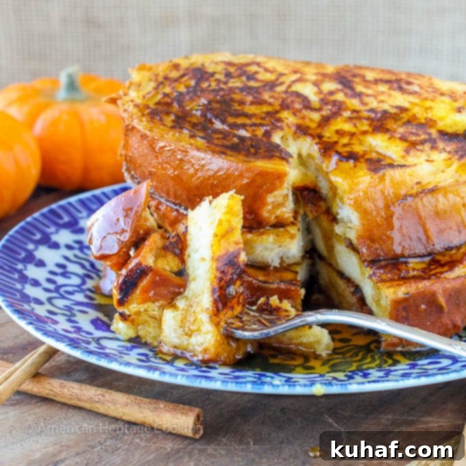 Close-up of golden Pumpkin Spice French Toast on a plate, ready to be served