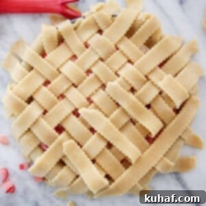 Simple Steps to a Beautiful Lattice Pie Crust 15 lattice pie crust on strawberry rhubarb pie.