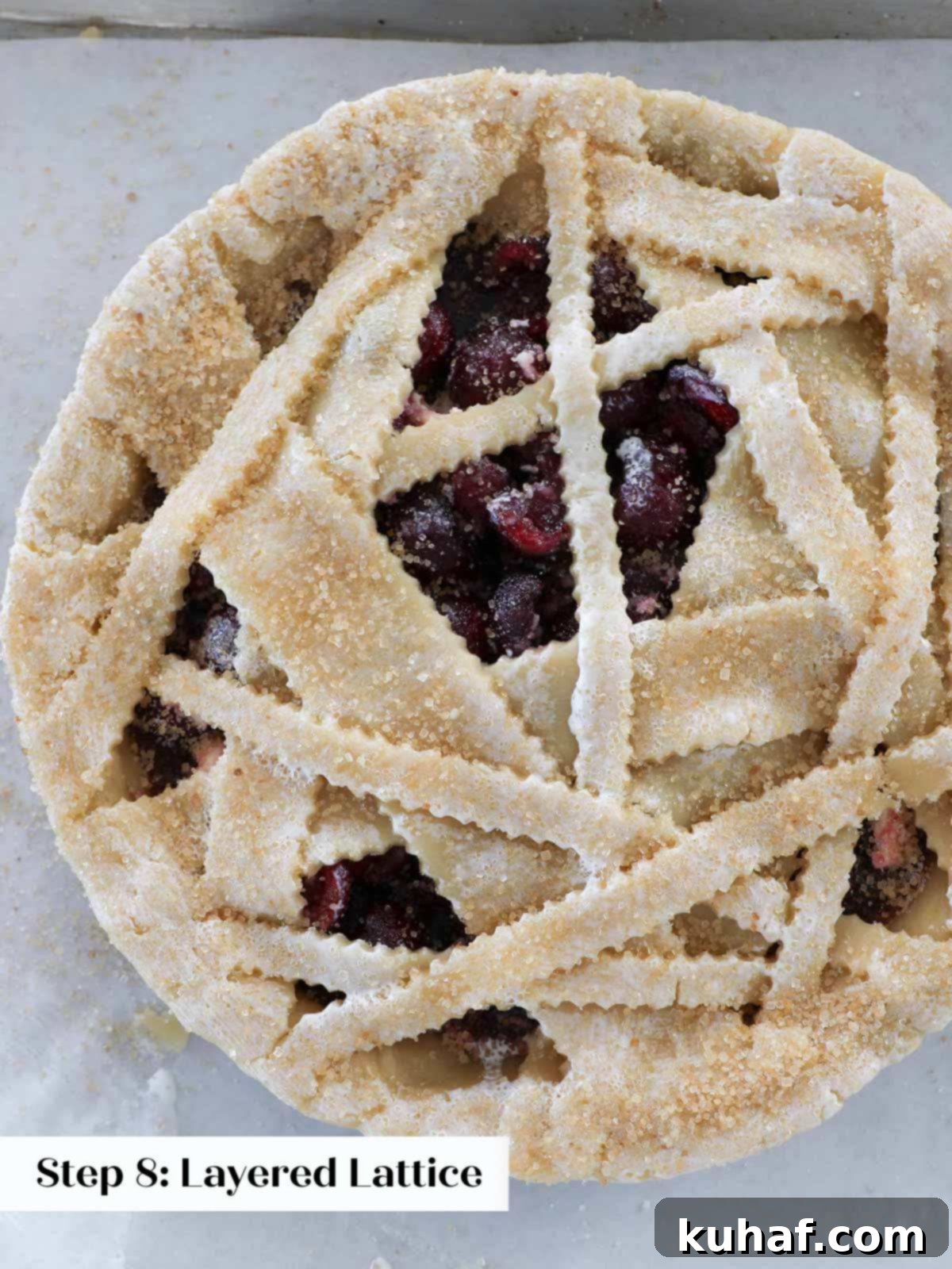 Simple Steps to a Beautiful Lattice Pie Crust 10 ready to bake pie with asymmetrical crust and turbinado sugar.