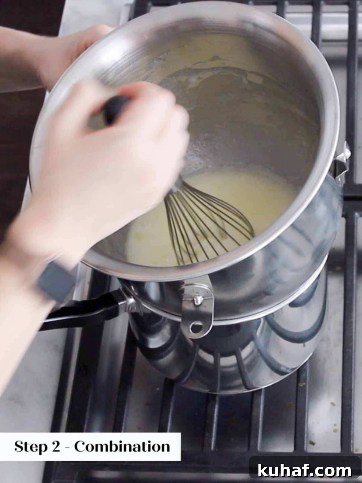 whisking swiss meringue over pot.