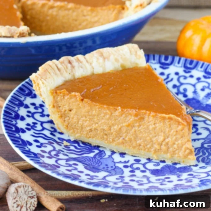 Classic Pumpkin Pie with a Twist | My new favorite pumpkin recipe has lemon zest, spices, vanilla and brown sugar! So amazing! 
