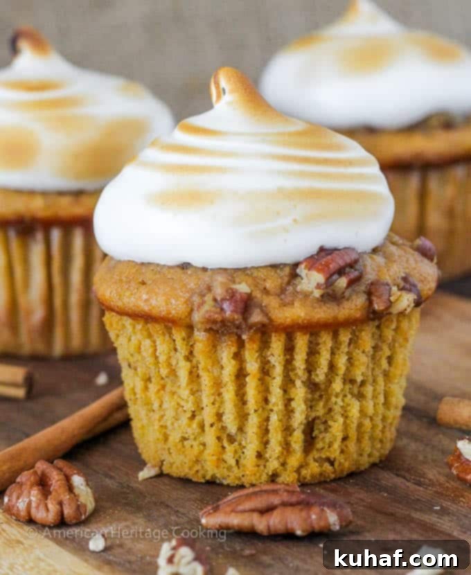 A beautifully presented Sweet Potato Casserole Cupcake on a white plate, ready to be enjoyed.