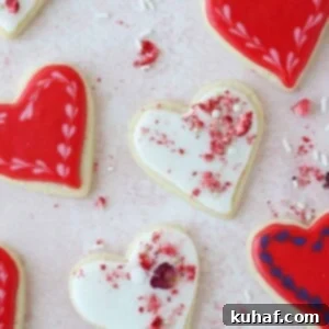 white red hearts with pink strawberries and rose petals.