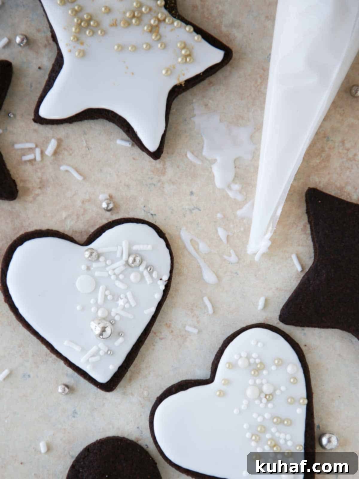 easy cookie icing on cookies and cream surface, with beautifully decorated sugar cookies.