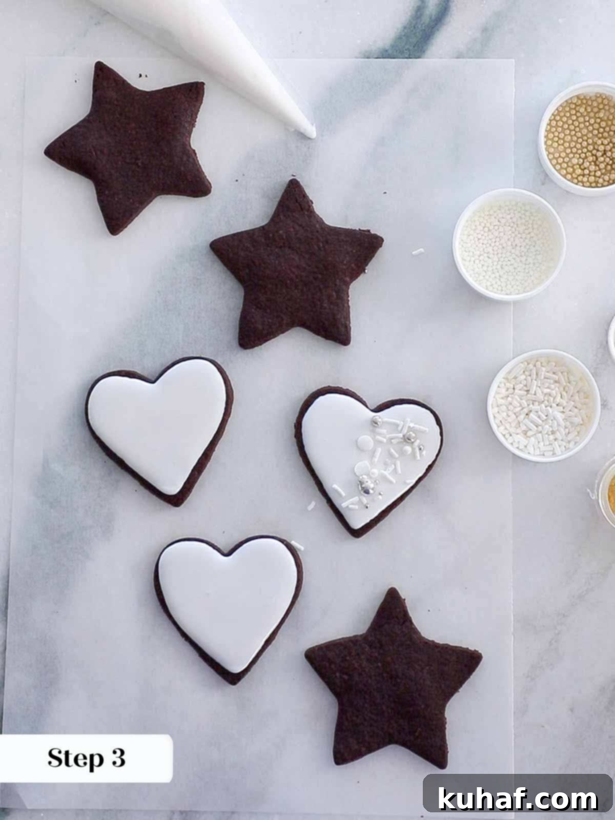 decorated sugar cookies featuring white icing and sprinkles.