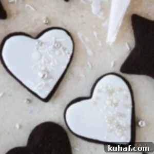 two iced sugar cookies.