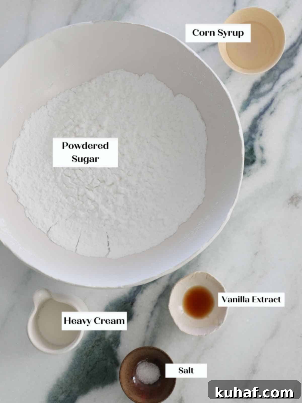 easy cookie icing ingredients displayed on a wooden surface.