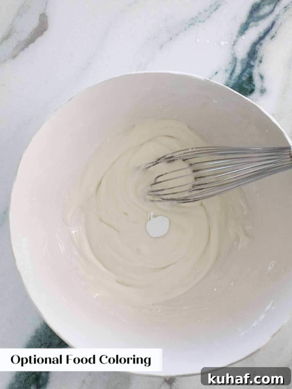 adding white gel food coloring to white icing for enhanced opacity.