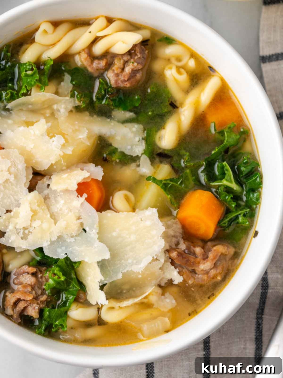 shaved parmesan on kale soup.