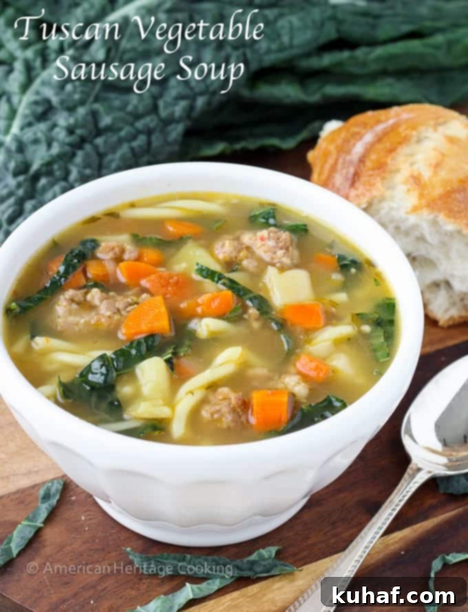 A bowlful of Italian sausage soup with a silver spoon.