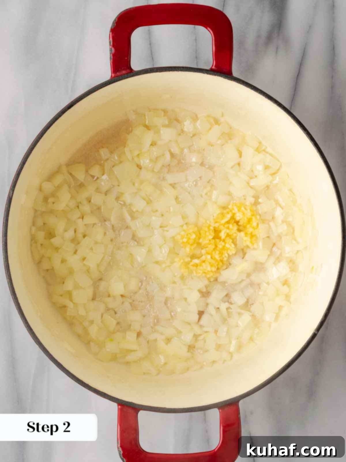 sweating onions and garlic in pot.