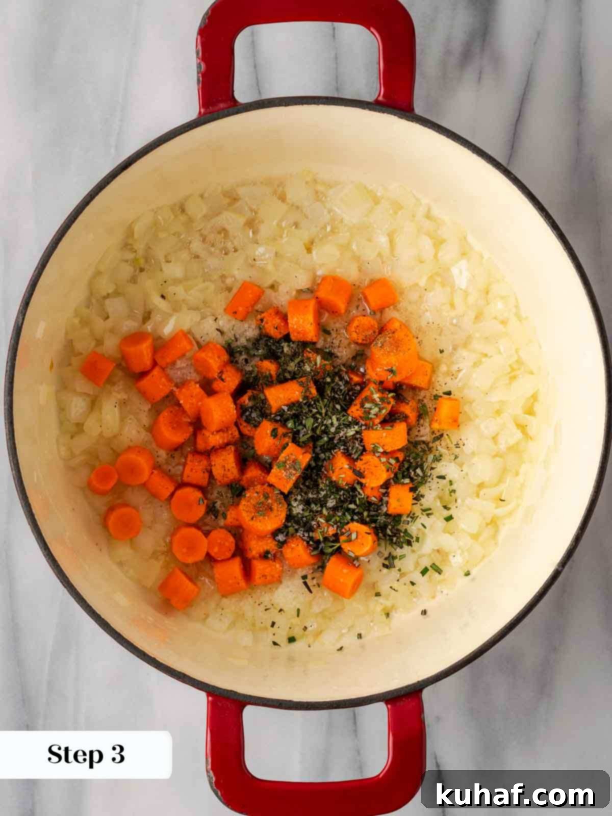 cooking vegetables in red pot.