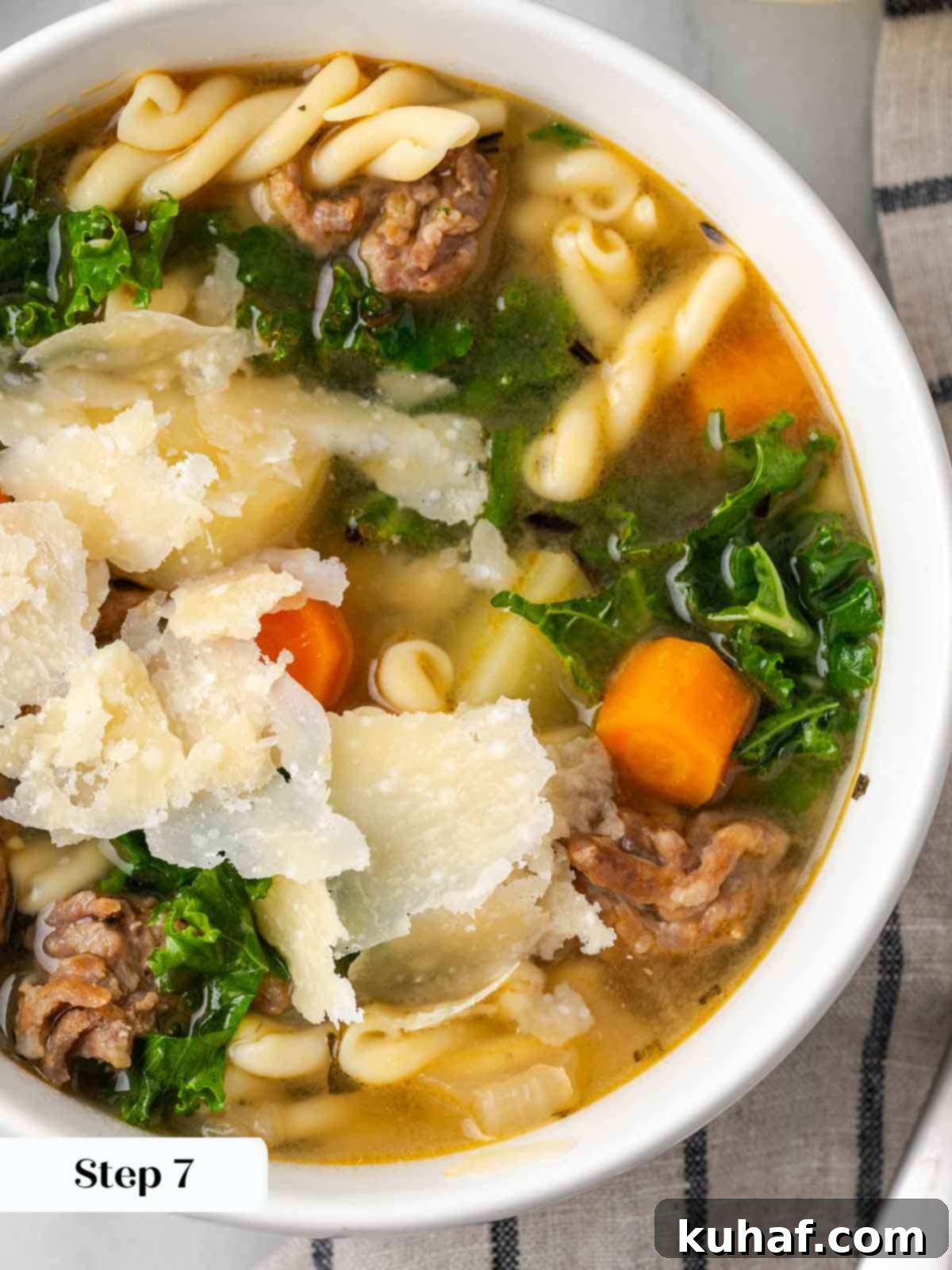 soup in bowl with green kale.