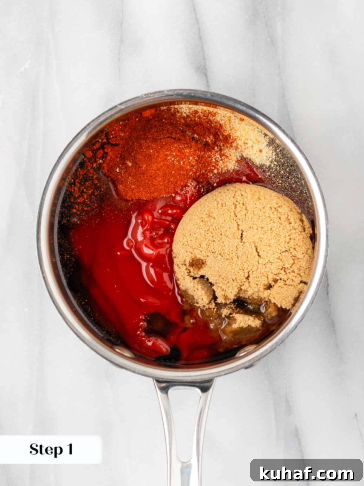 All BBQ sauce ingredients combined in a pot before cooking, showing a smooth, whisked consistency.
