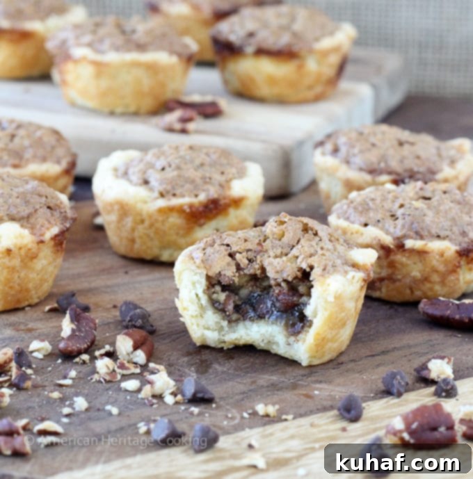 These Chocolate Pecan Tassies are like mini pecan pies with a cream cheese crust! Based on my great-grandmother's recipe! 