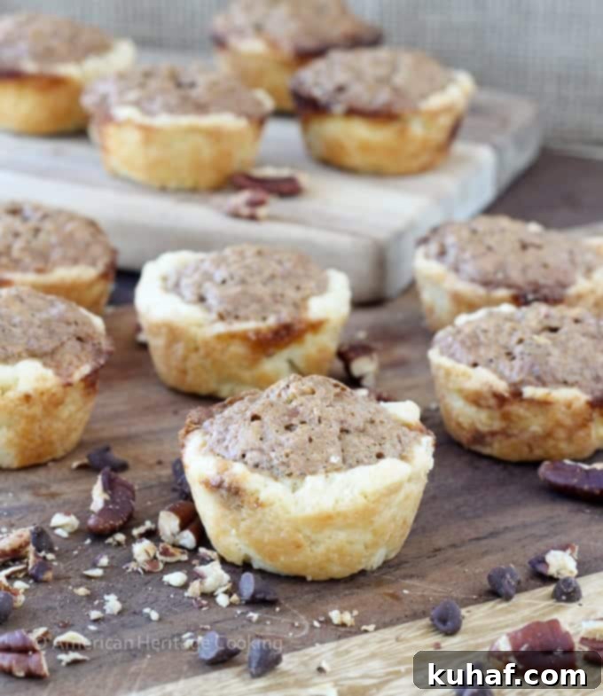 These Chocolate Pecan Tassies are like mini pecan pies with a cream cheese crust! Based on my great-grandmother's recipe! 