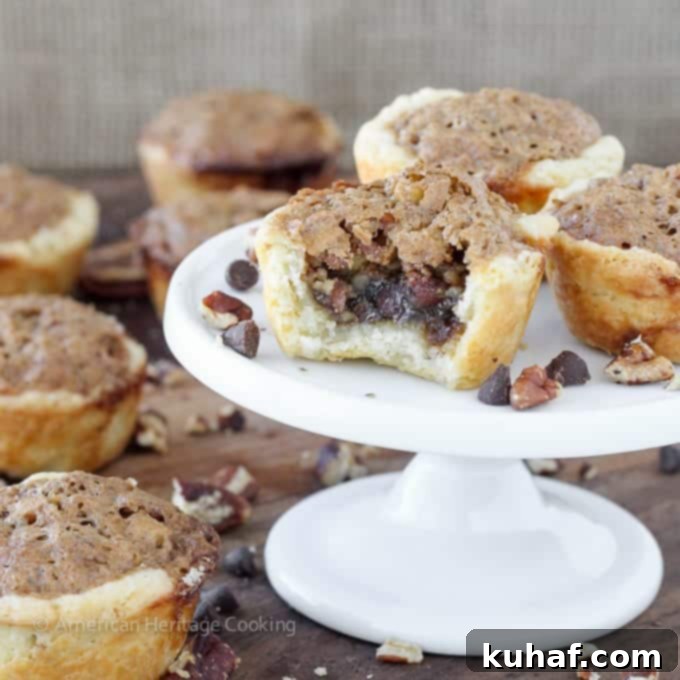 These Chocolate Pecan Tassies are like mini pecan pies with a cream cheese crust! Based on my great-grandmother's recipe! 