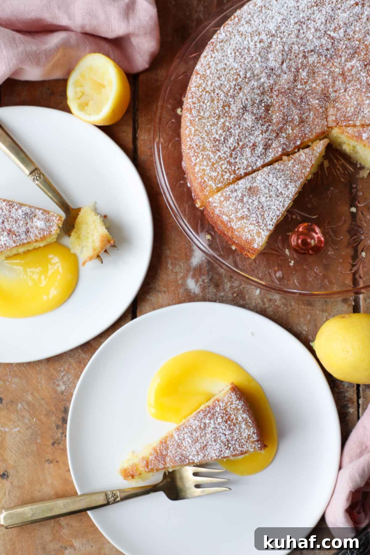 lemon olive oil cake plated on white plates with lemon curd.