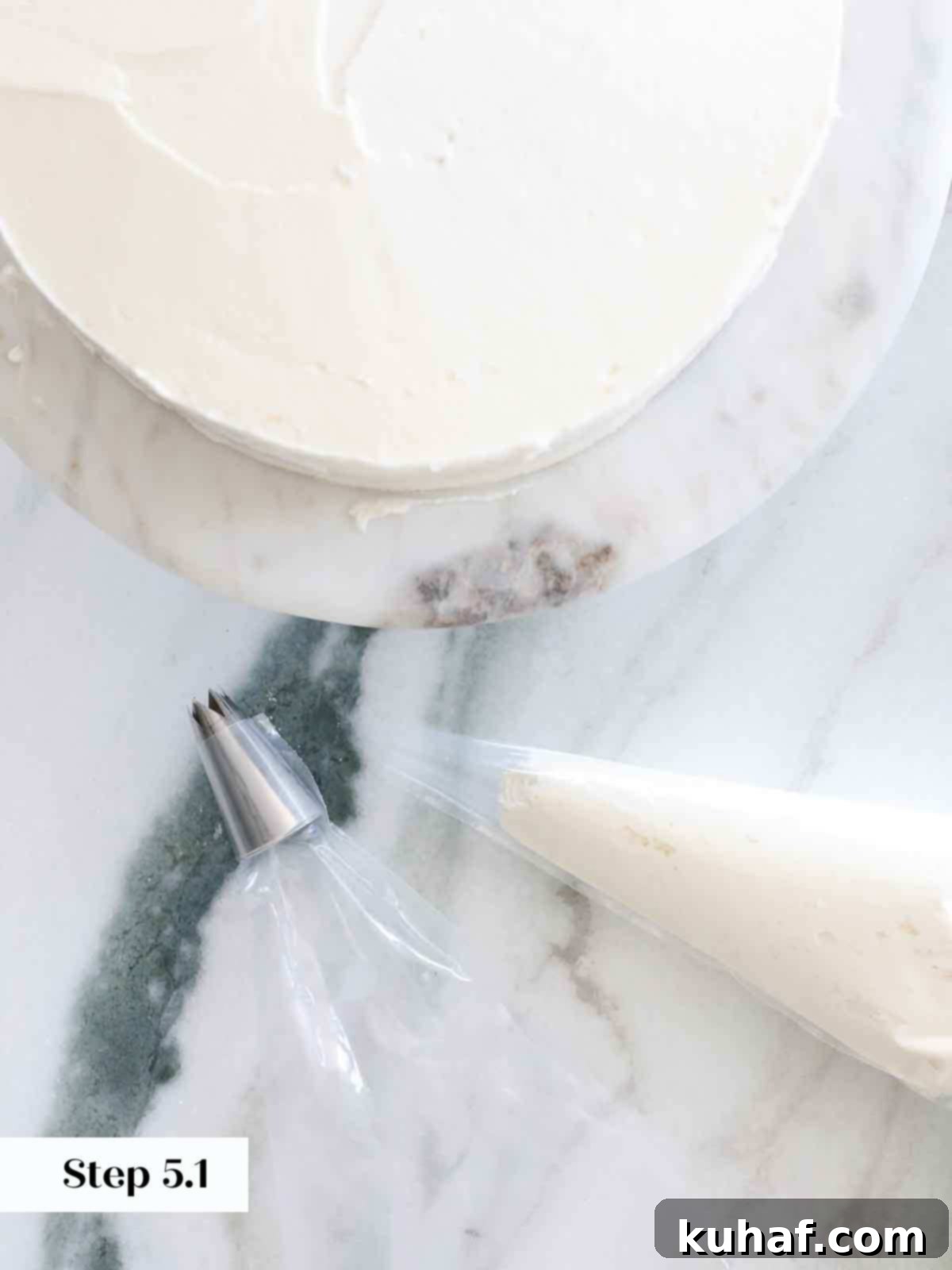 A piping bag fitted with a star tip, ready for cake decoration.