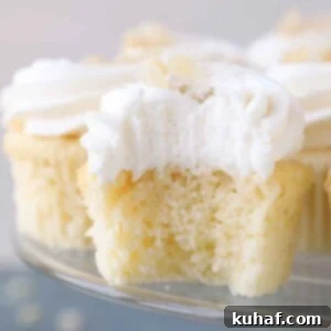 interior texture of lemon cupcake with lemon buttercream.