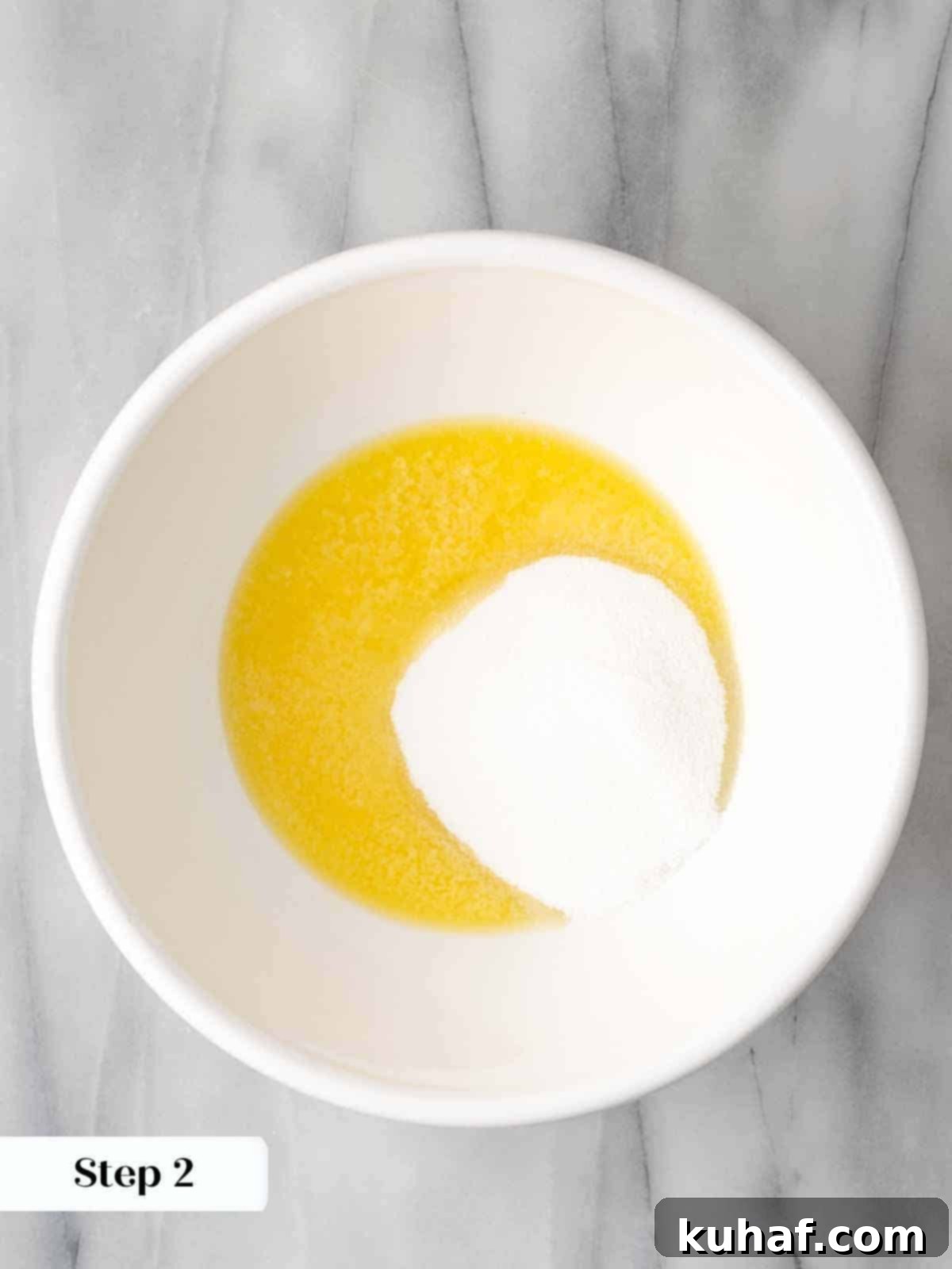 melted butter and sugar in white bowl.