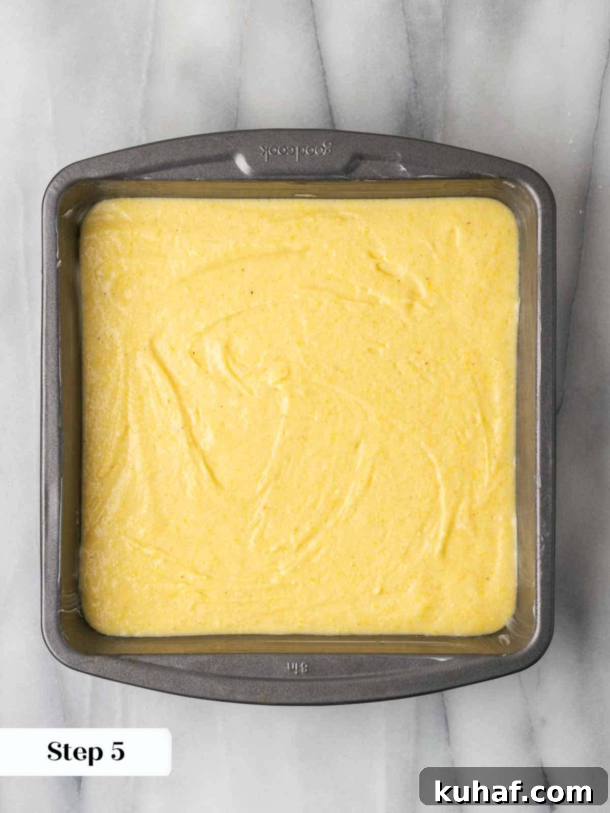 smooth cornbread batter in pan.