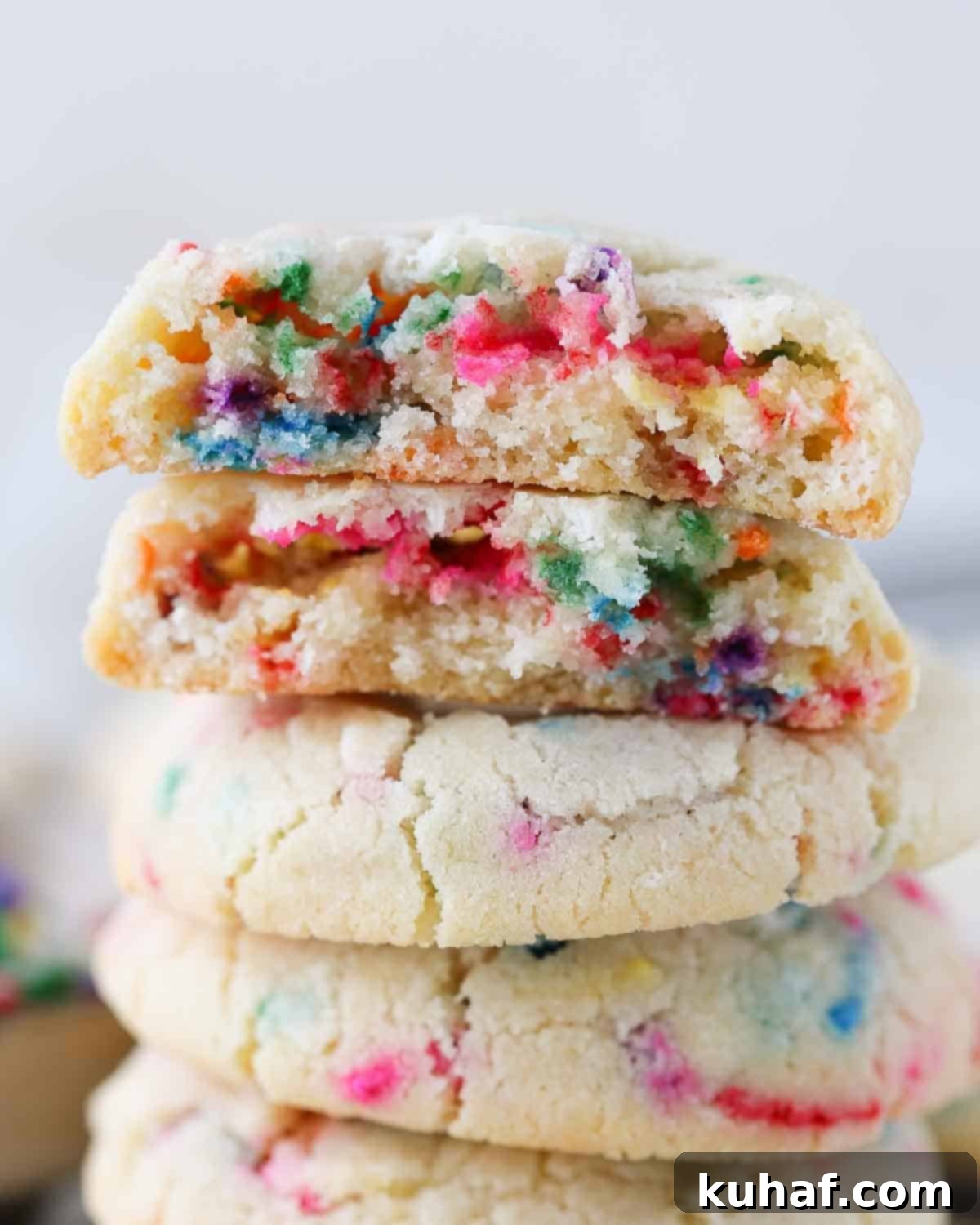 Funfetti cookies covered in multi-colored sprinkles for a vibrant and festive look.