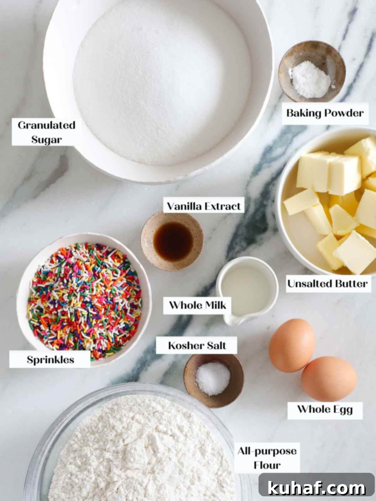 All the ingredients laid out for making funfetti cookies, ready for mixing.