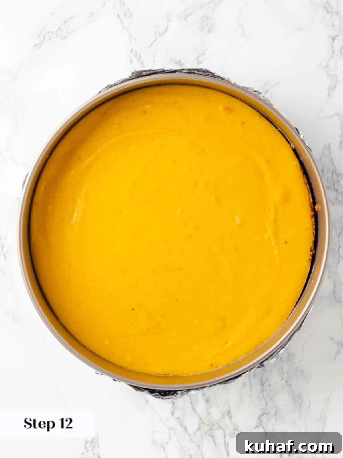 Decadent Pumpkin Cheesecake 18 A freshly baked pumpkin cheesecake, golden brown and perfectly set in its springform pan.
