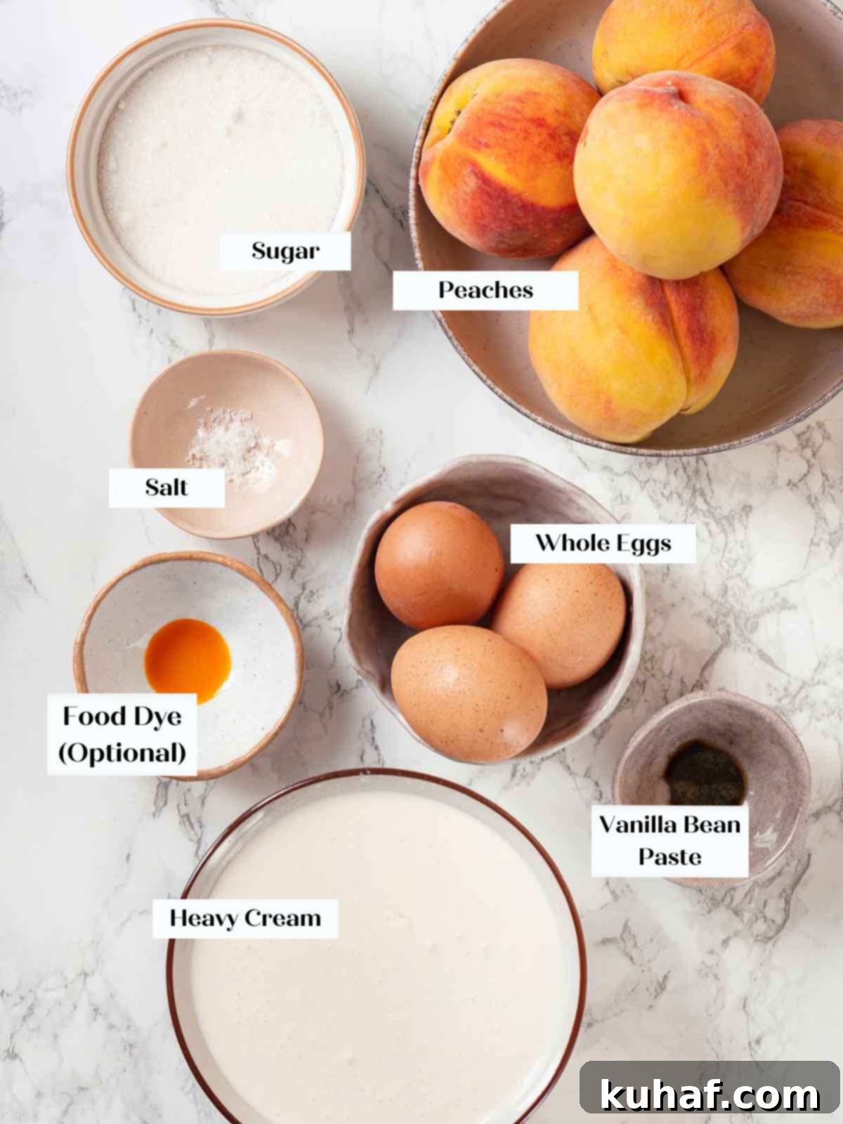 A flat lay of fresh peach ice cream ingredients on a pristine marble surface, ready for preparation.