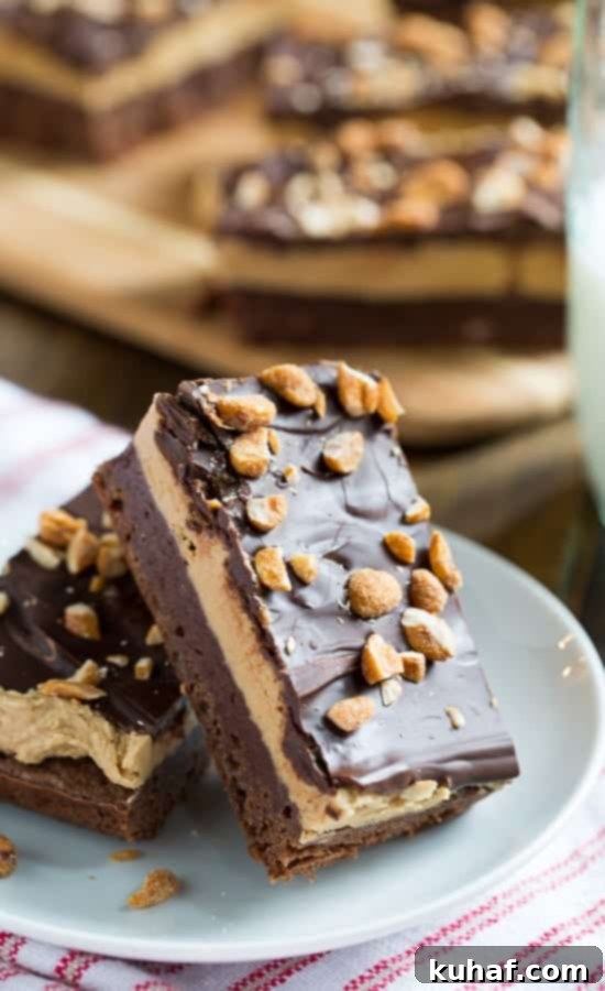 You will love these Chocolate Peanut Butter Bars with a rich brownie on the bottom and a generous layer of peanut butter filling in the middle!