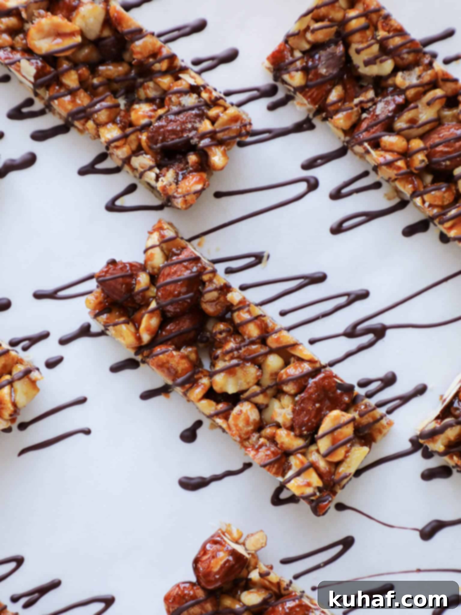 Close-up of freshly sliced Homemade KIND Bars, displaying their dense, nutritious, and nutty texture, ready for snacking.