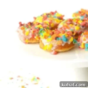 Fruity Pebble Cereal Milk Baked Donuts White Background