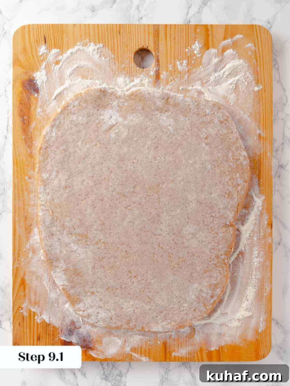 Flattened apple cider donut dough being prepared.