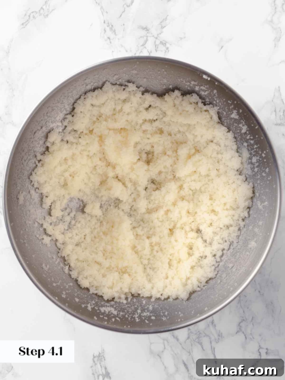 Butter and sugar being mixed for apple cider donuts.