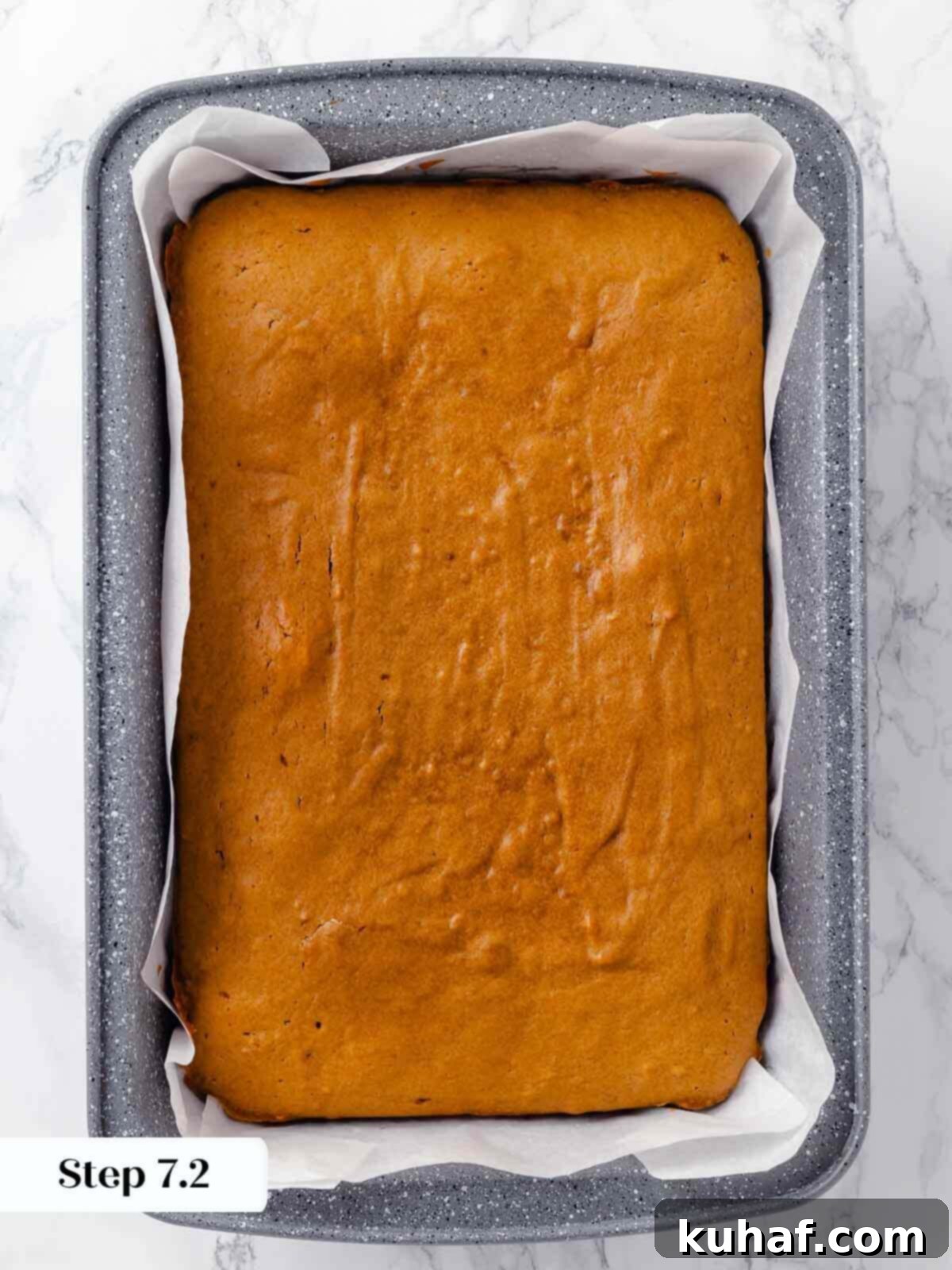 Delicious Autumn Pumpkin Squares 11 Unsliced, unfrosted pumpkin bars fresh from the oven.