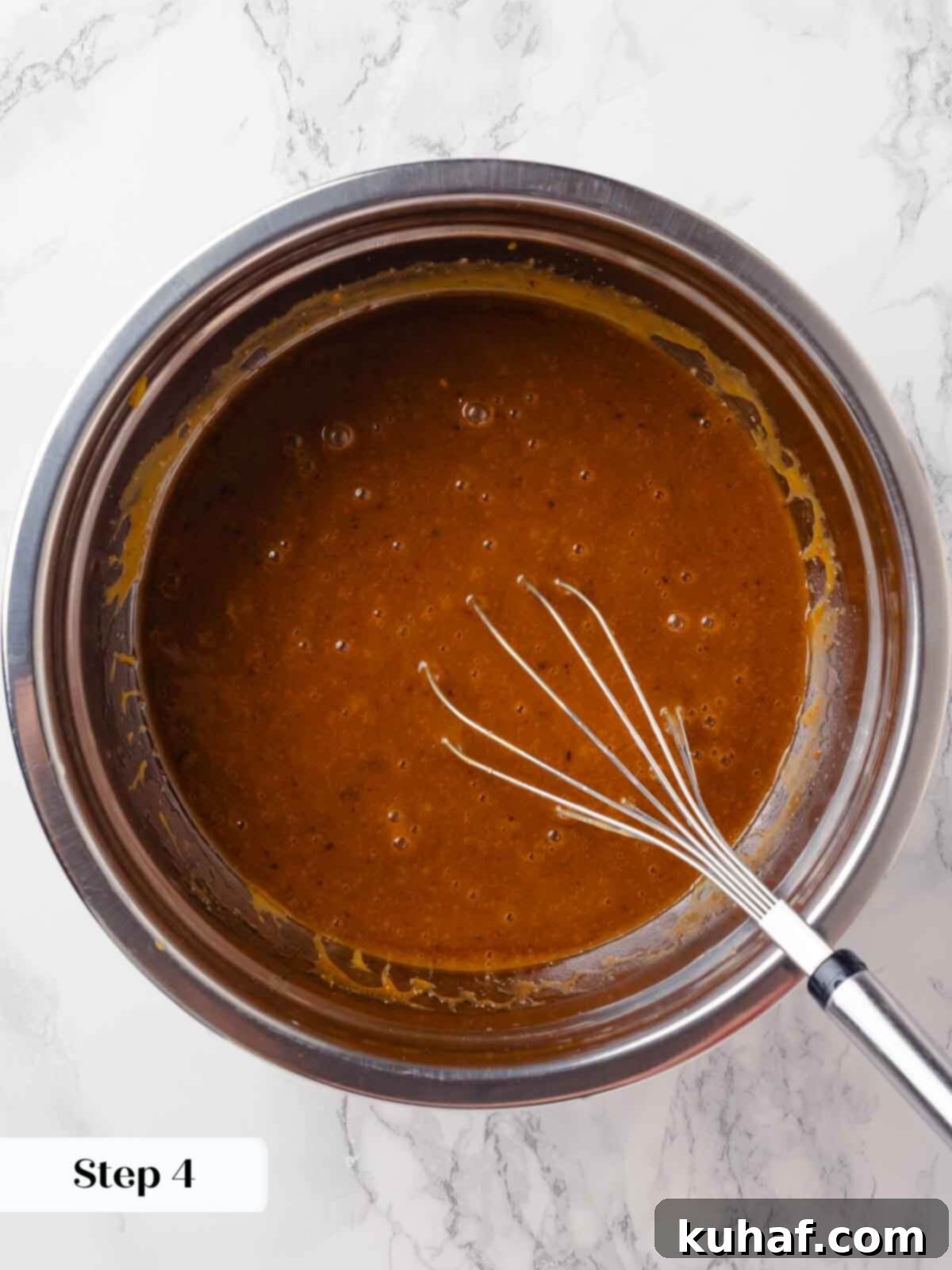 Delicious Autumn Pumpkin Squares 7 Sugar being added to the melted butter for pumpkin bars.