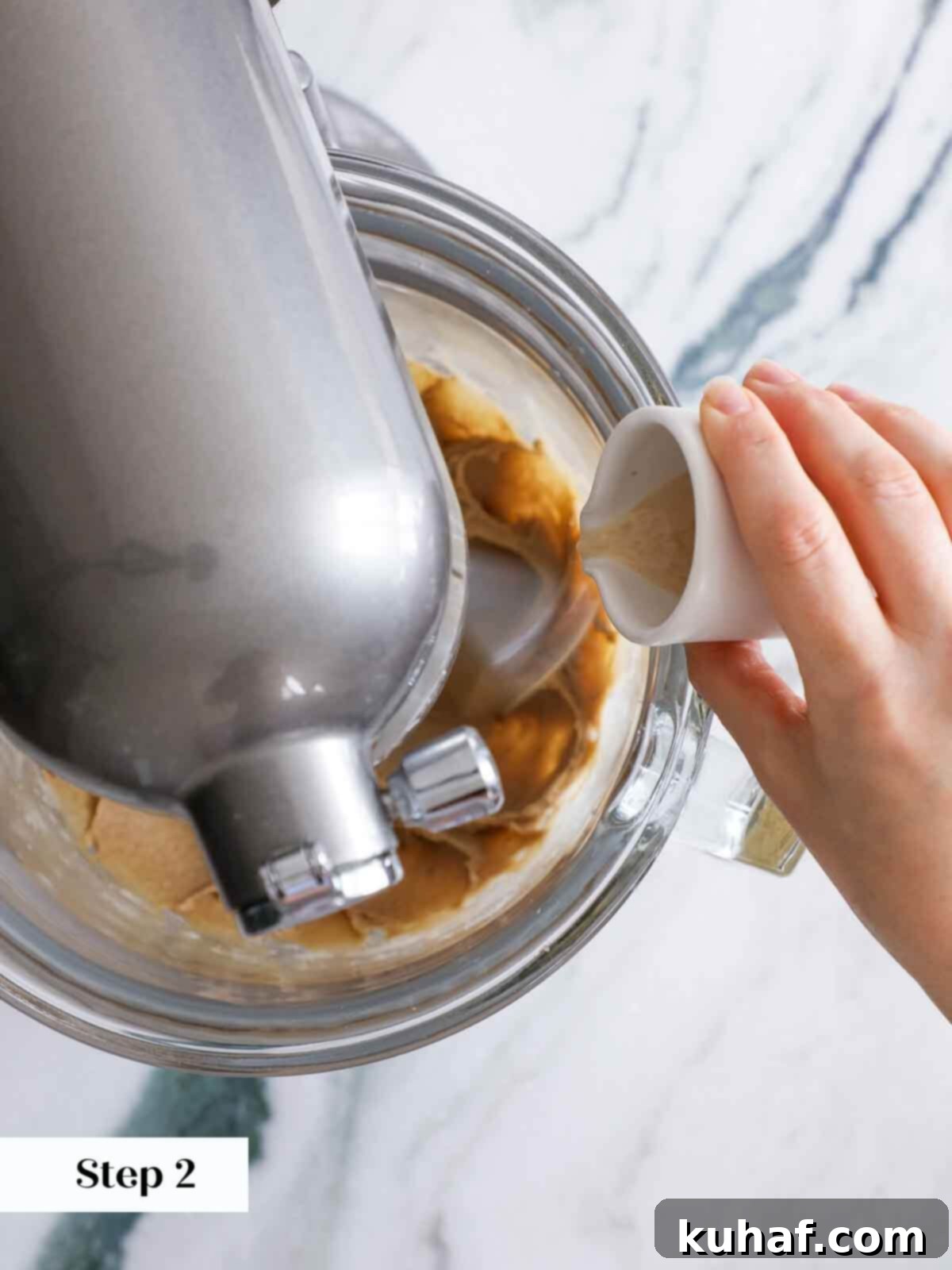 Warm Spiced Sugar Delights 5 Adding eggs and vanilla to the cinnamon sugar cookie dough mixture in a stand mixer