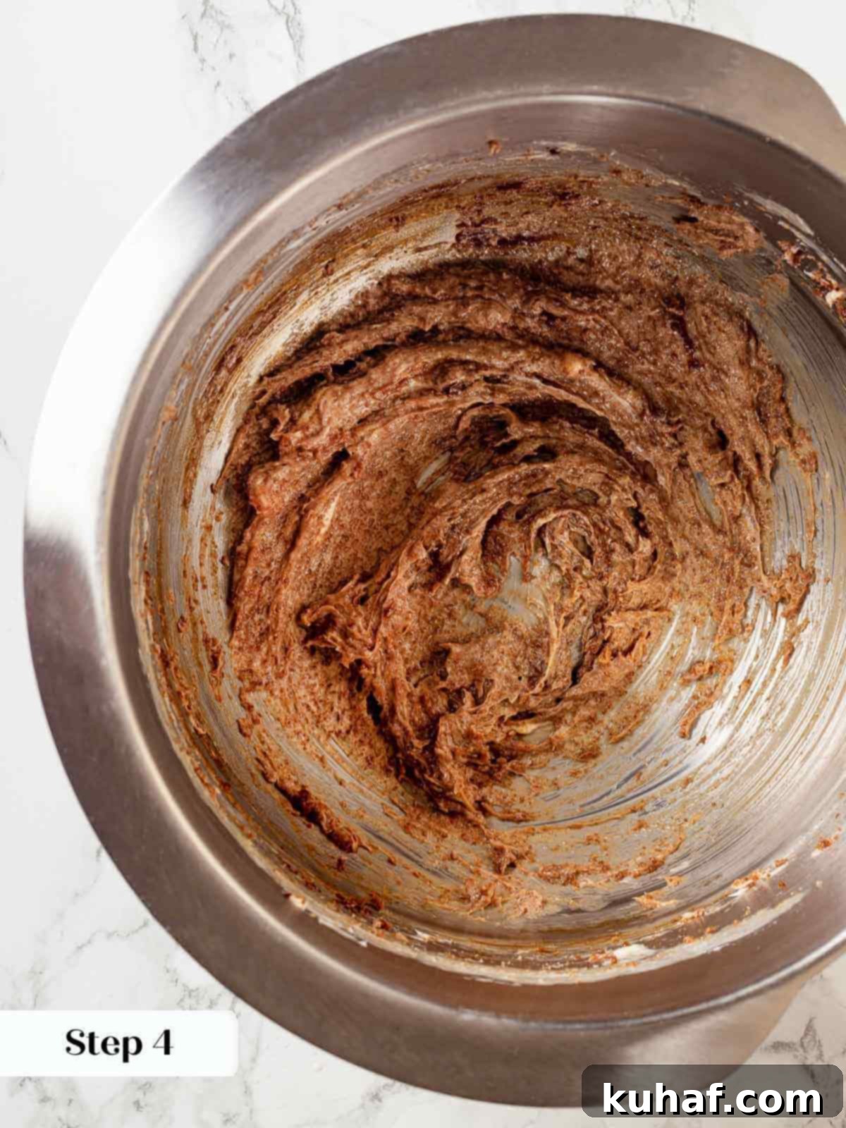 Creamed butter and molasses mixture for sticky toffee pudding batter.