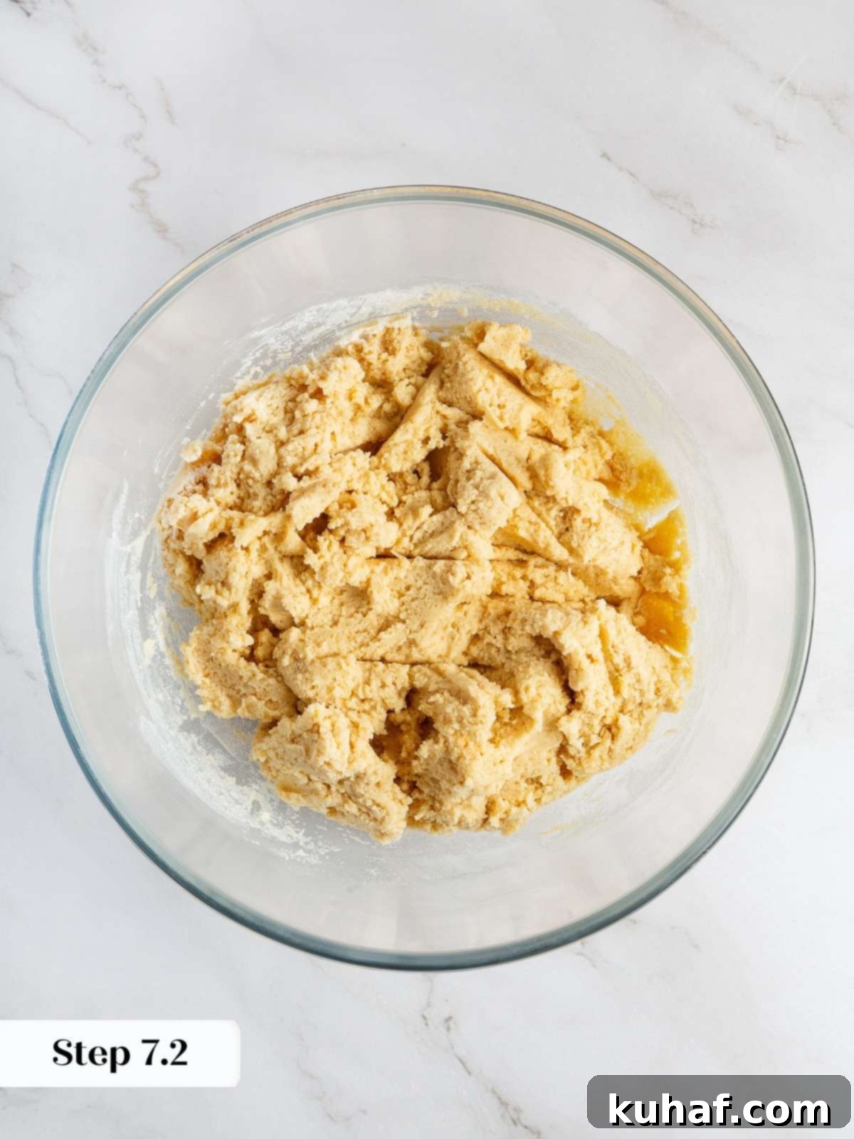 Luscious White Chocolate Raspberry Cookies 9 Cookie dough mixed with flour and dry ingredients, showing a ready texture for inclusions.