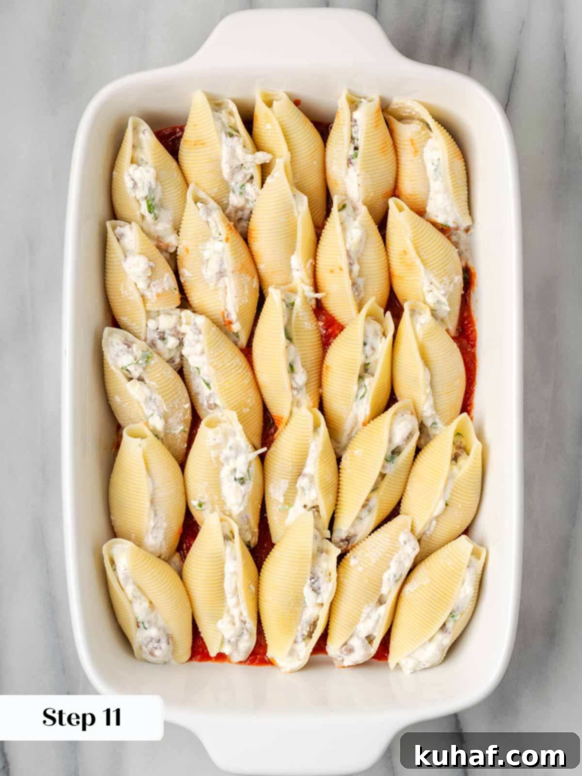 stuffed shells unbaked in casserole dish.